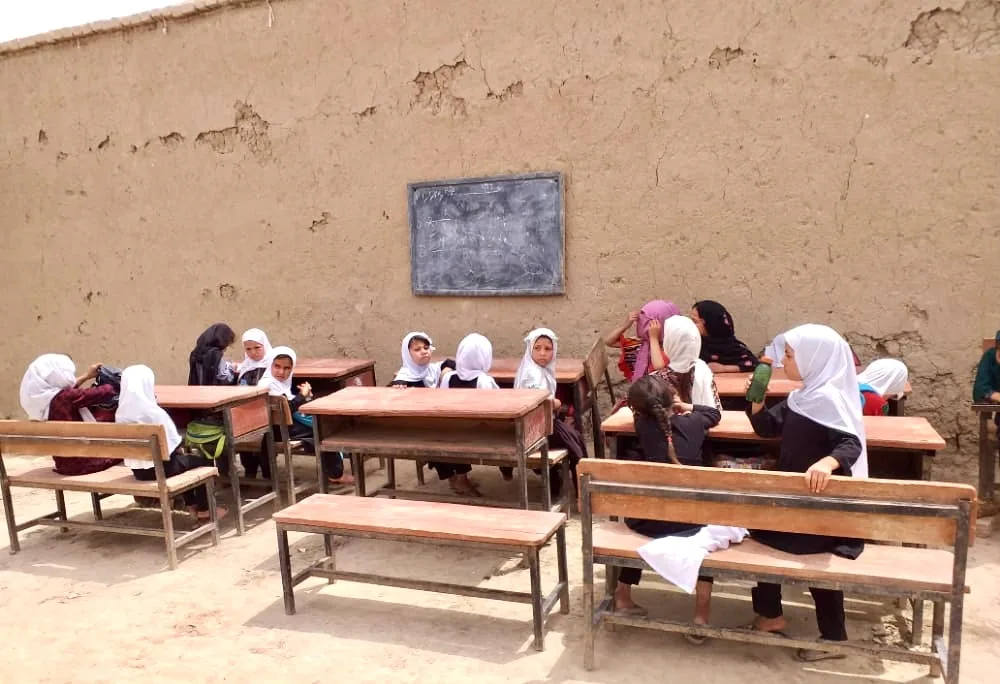 Learning Under the Open Sky: Afghan Children Study Outdoors Despite Severe Classroom Shortage