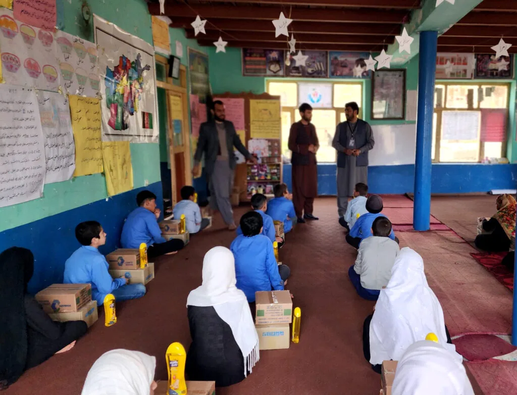 Gate of Hope volunteers distributing aid to Afghan families