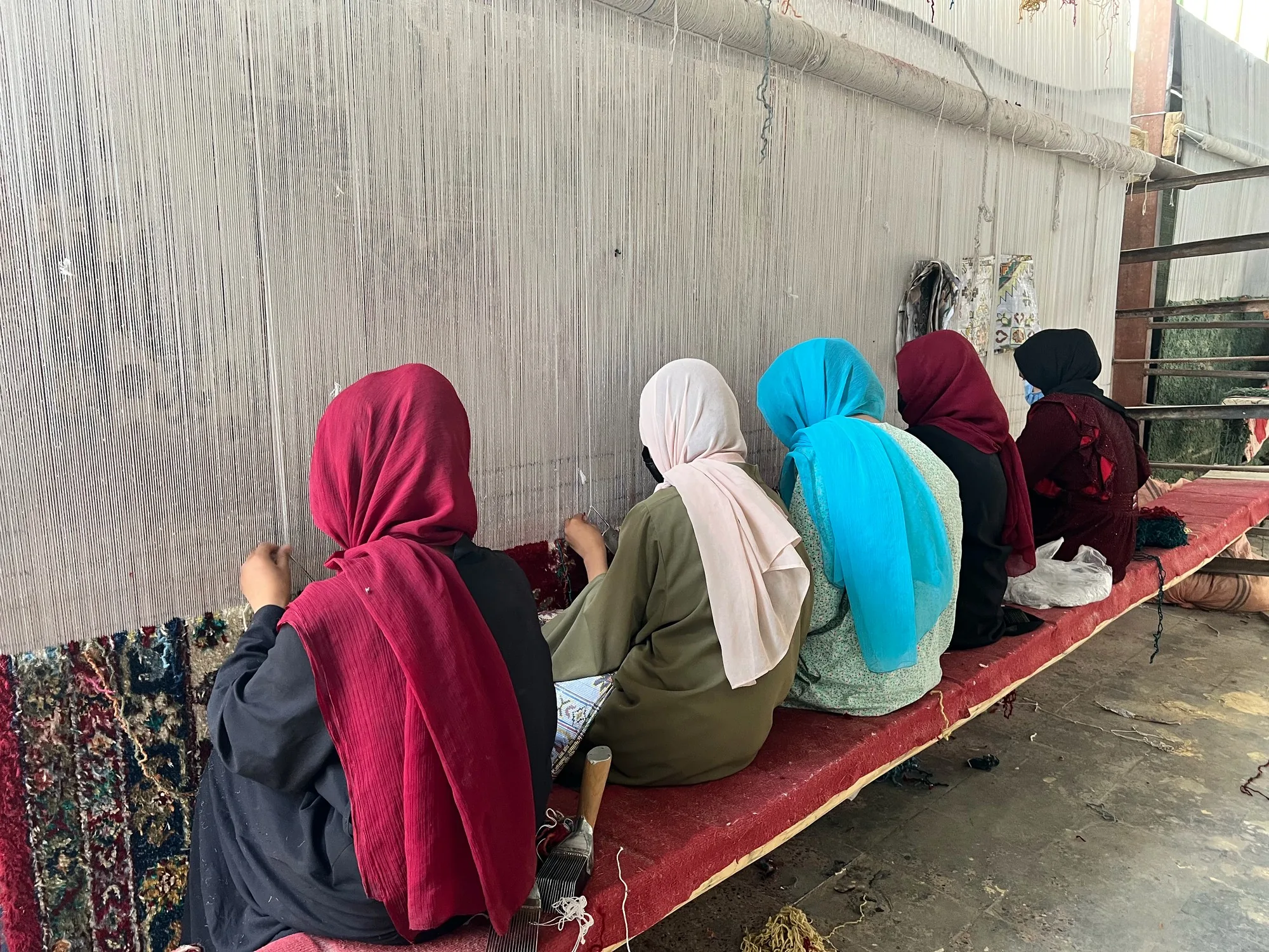 Threads of Resilience: Afghan Women Revive Traditional Carpet Weaving with Gate of Hope